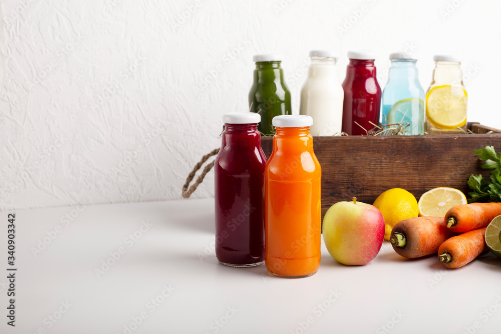 Fruit and vegetables smoothie with fresh ingredients on white Fruit and vegetables smoothie with fresh ingredients on white
