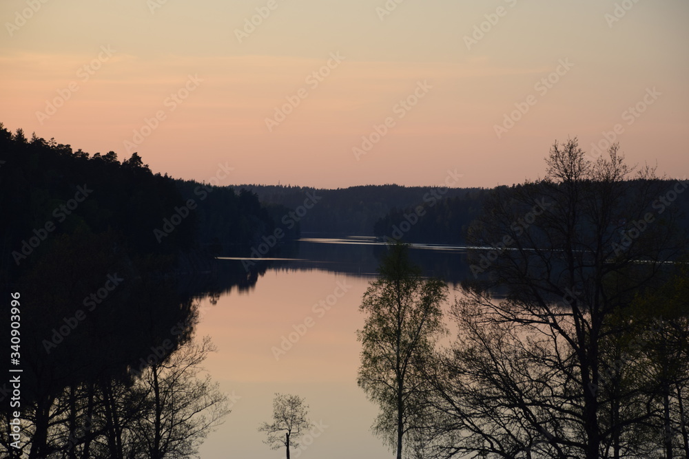 Obraz premium sunset over the river