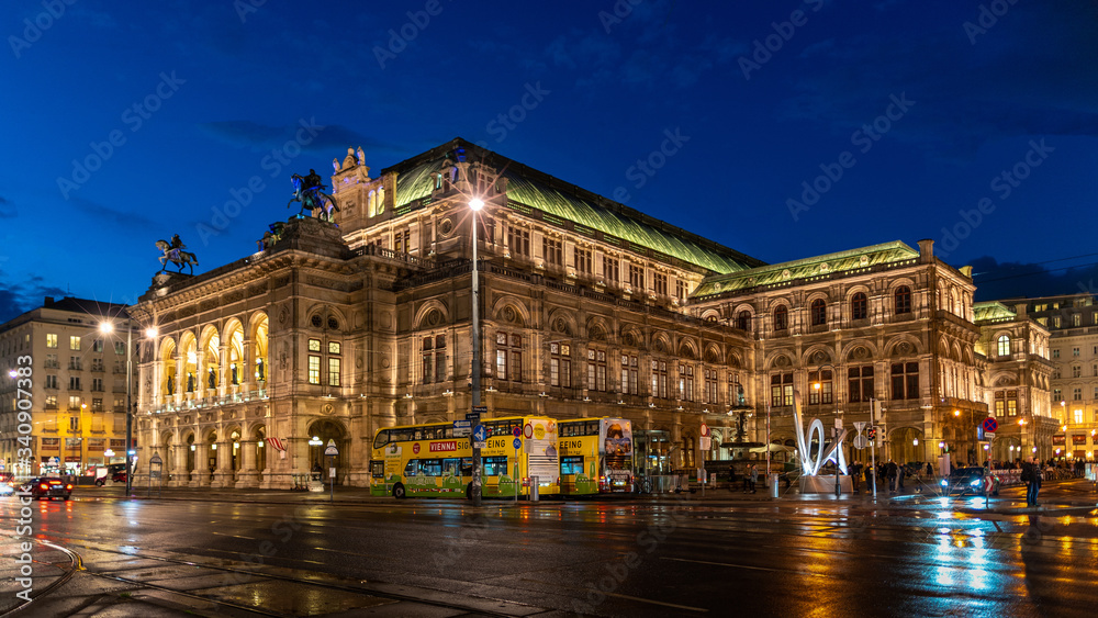 vienna state opera house in austria at night. popular tourist destination in beautiful street light. 
