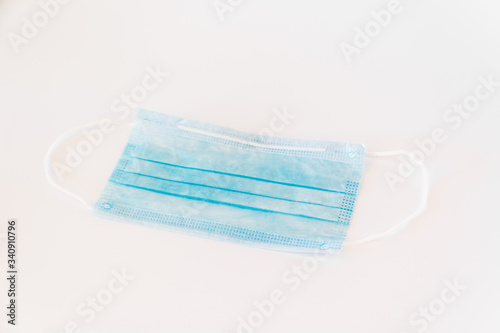 Surgical protection mask to cover mouth and nose flat lay concept photo