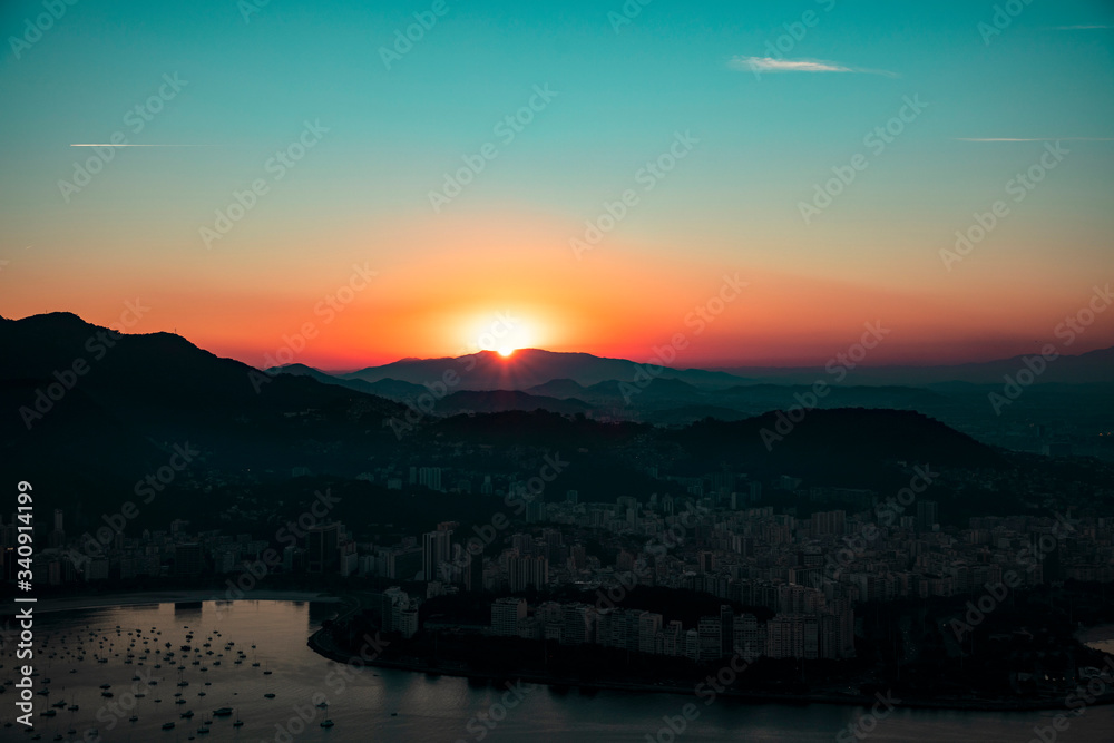 Panoramic aerial view of Guanabara Bay and Sugarloaf Mountain at sunset, Rio de Janeiro, Brazil.