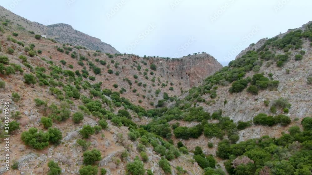 Mountainous rocky island terrain of Spinalonga Crete Greece aerial