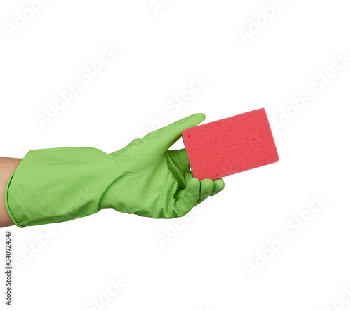 hand holds red sponge for washing dishes