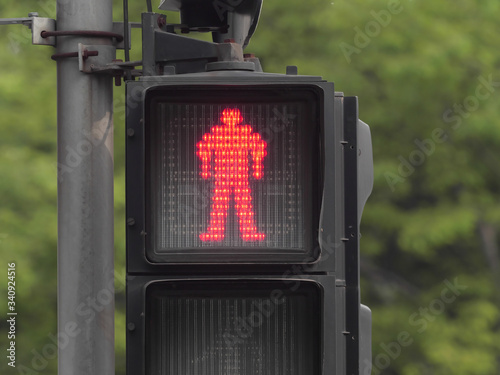Photography close up of red pedestrian traffic light in Shanghai city.