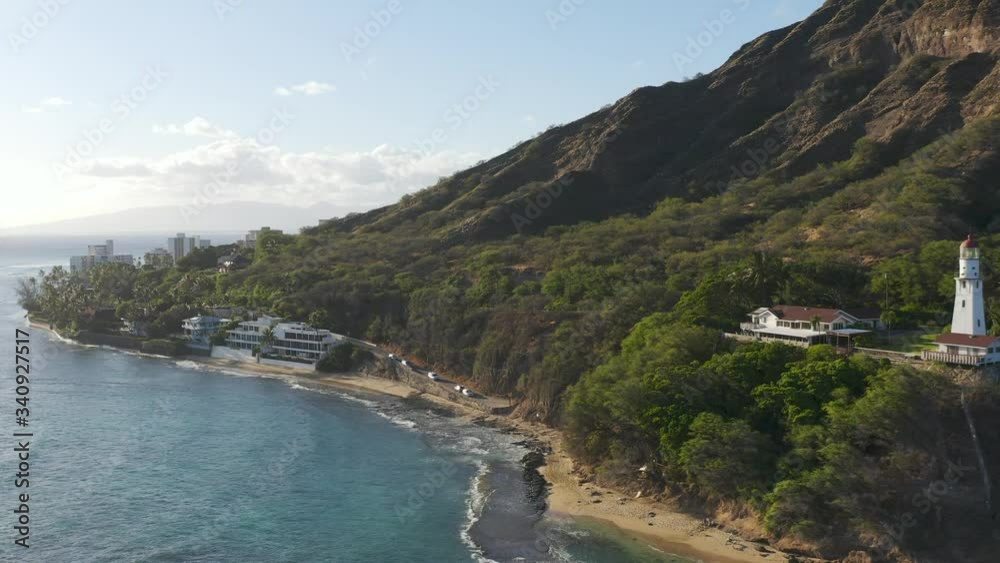 The best beaches in world. Top view of the beach of the Hawaii on shore of blue sea. Hawaii Vacation. White sand, beautiful beach, tall palm trees. Turquoise sea water vacation The best beaches in world. Top view of the beach of the Hawaii on shore of blue sea. Hawaii Vacation. White sand, beautiful beach, tall palm trees. Turquoise sea water vacation