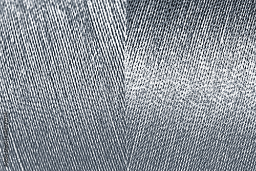 Shiny silver thread textured background