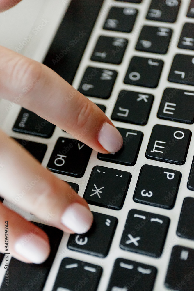 Woman is typing on laptop, female hands are typing on keys
Woman is typing on laptop, female hands are typing on keys