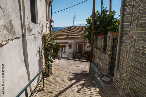 Fototapeta Naklejka Na Ścianę i Meble -  KAVALA, GREECE - SEPTEMBER, 15, 2018: Beautiful streets with old house in the old part town