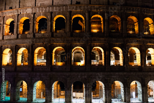 Night Colosseum with lighting. The main attraction of Rome in February 2020. photo