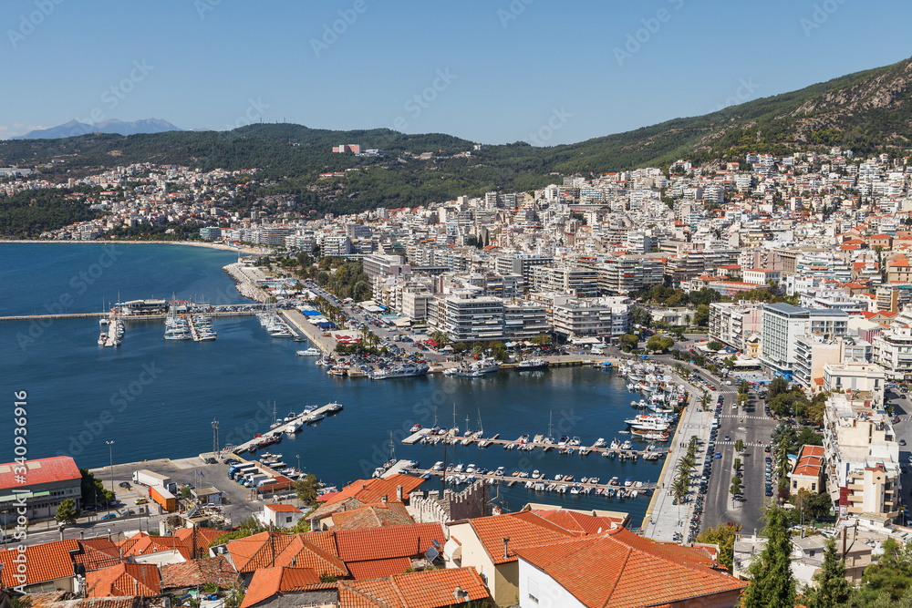 Aerial panoramic view of Greek resort Kavala, big port with old fortress and old town