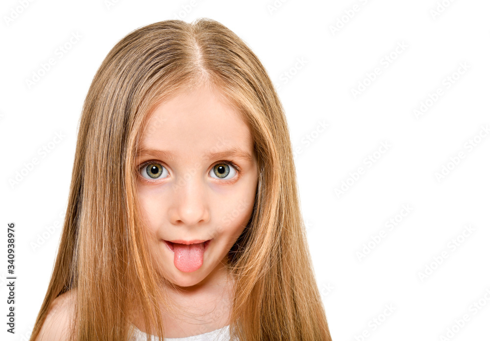 Portrait of a beautiful funny girl showing tongue, closeup, isolated on white background Portrait of a beautiful funny girl showing tongue, closeup, isolated on white background