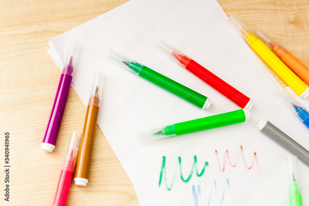 Felt-tip pens, pencils in boxes, different colors, the order on the table, the work of the child, home creation and order, the joy of drawing, school desk and quarantine Felt-tip pens, pencils in boxes, different colors, the order on the table, the work of the child, home creation and order, the joy of drawing, school desk and quarantine