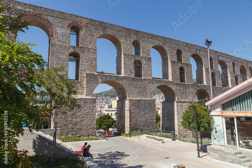 Medieval aqueduct Kamares in the Kavala city. Sunny summer day in the Macedonia, Greece, Europe. photo