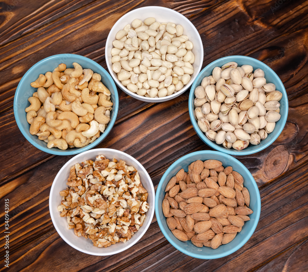 Assortment of nuts. Walnuts almonds, pistachios, cashews, peanuts