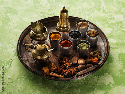 Fototapeta Naklejka Na Ścianę i Meble -  Indian spices. spices seasoning spicy and herbs on a dark background.