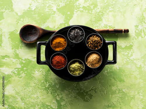 spices seasoning spicy, in a pan top view. Indian spices