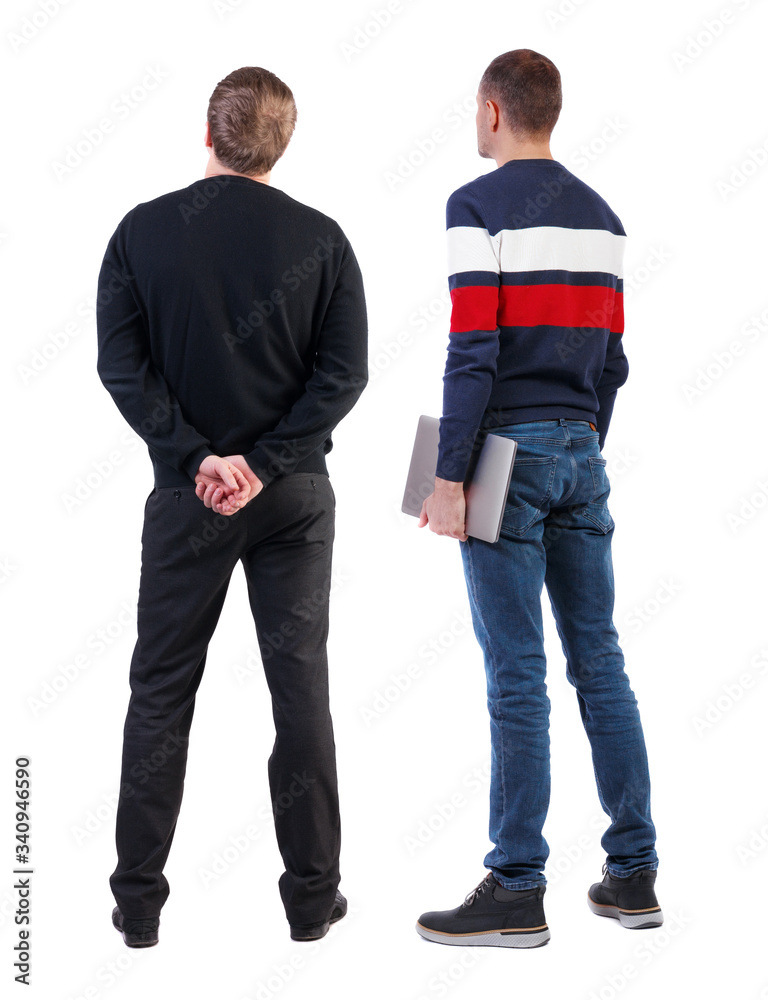 Back view two man in sweater with laptop. Back view two man in sweater with laptop.
