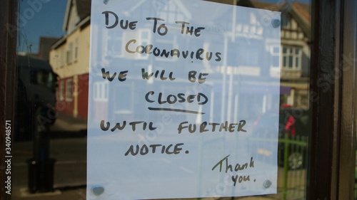 Independent shop closed until further notice in window due to the COVID 19 coronavirus pandemic, bars, cafes, restaurants, clubs all shut cause of this international crisis 