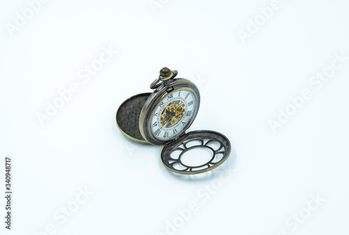 Pocket watch, close up and isolated on white background