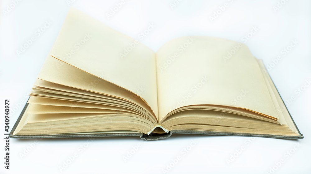 Open yellowed book with blank pages on white background. Open yellowed book with blank pages on white background.