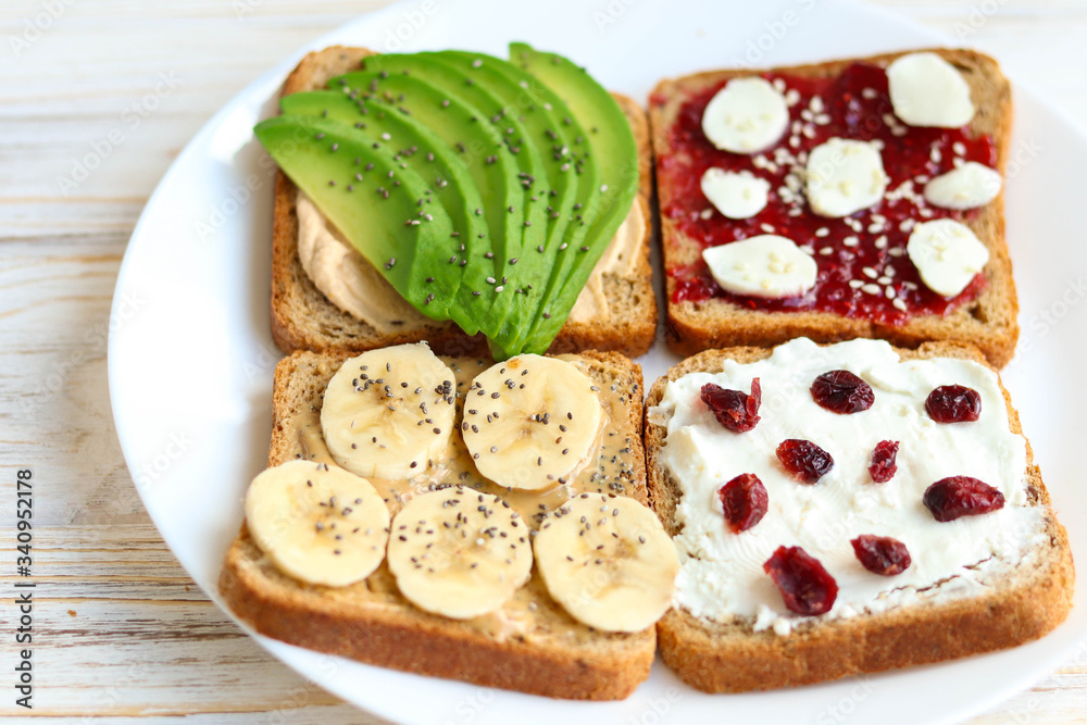 Toasts with avocado for breakfast, healthy breakfast on the table