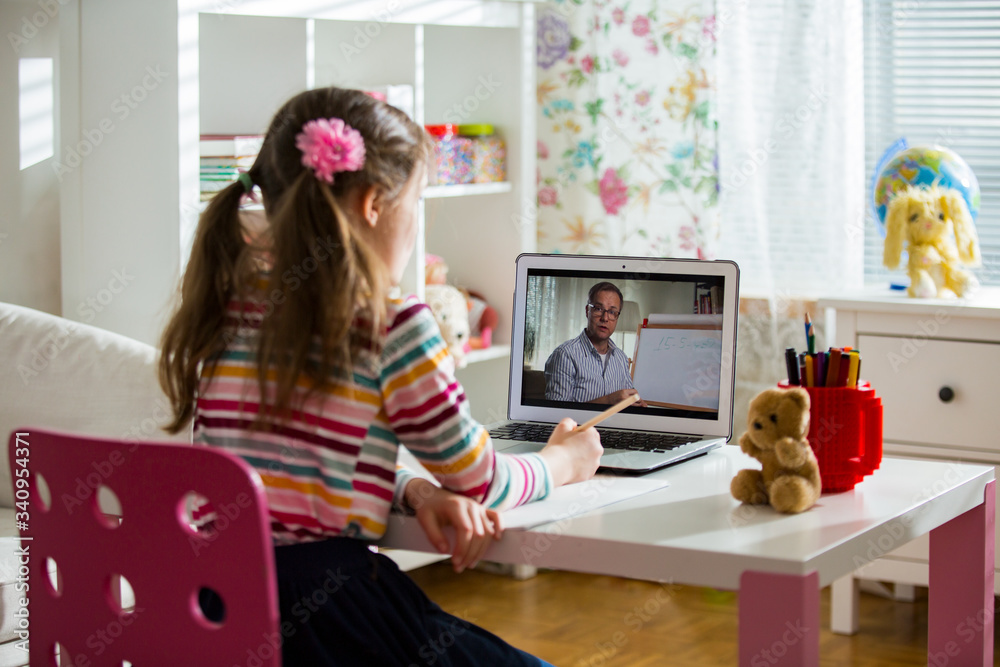 Middle-aged distance teacher having video conference call with pupil using  webcam. Online education and e-learning concept. Home quarantine distance  learning and working from home. Stock Photo | Adobe Stock