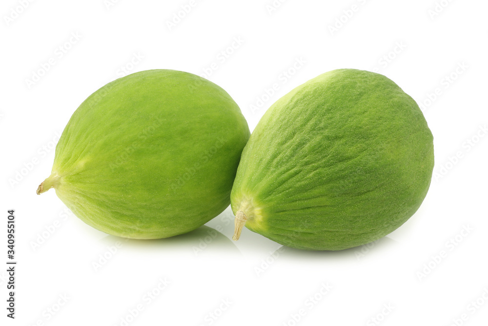 two fresh cumelo's (mix between a cucumber and a melon) on a white background two fresh cumelo's (mix between a cucumber and a melon) on a white background
