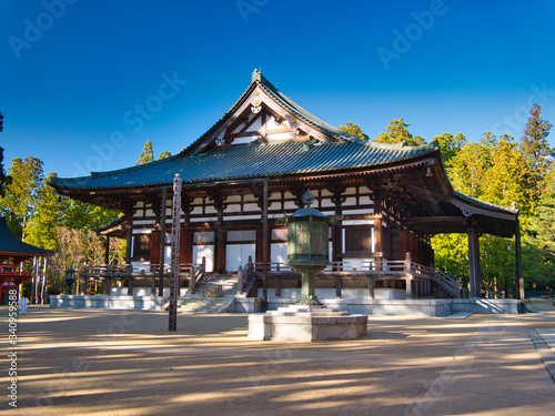 Temple buildings at Mount Koya settlement in Wakayama Prefecture to the south of Osaka - taken on a sunny day with clear, blue skies. photo