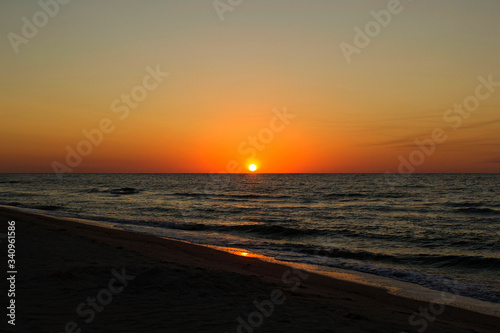 Picture of beautiful sunset or sunrise at calm seaside