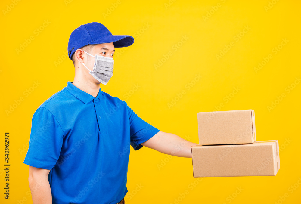 delivery worker man wearing face mask protective giving cardboard boxes delivery worker man wearing face mask protective giving cardboard boxes