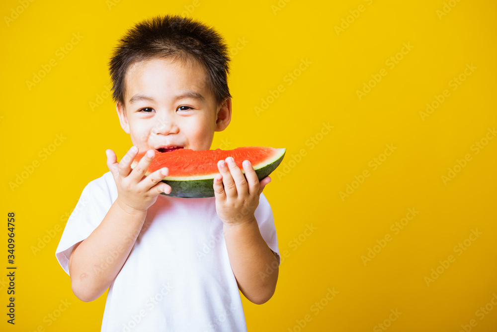 kid cute little boy attractive laugh smile playing holds cut watermelon fresh for eating kid cute little boy attractive laugh smile playing holds cut watermelon fresh for eating