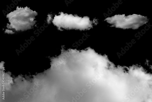 Clouds isolated on black background.
