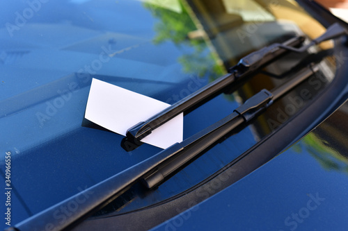 Close up of parking fine on car windscreen. 