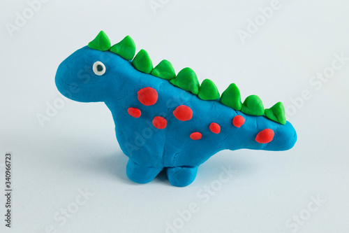 Fototapeta Naklejka Na Ścianę i Meble -  step by step making dinosaur with play dough for children's activity in the school art lesson.