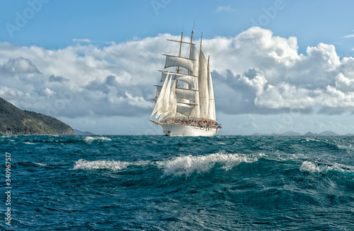 Obraz na plátne Sailing ship at sea under sails. Yachting. Cruise. Travel