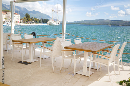 Cozy empty open cafe on the sea promenade  Tivat  Montenegro.