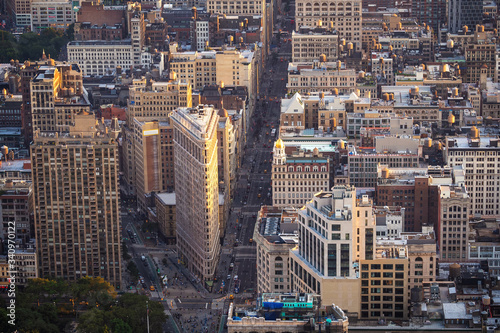 Aerial view of Manhattan including architectural landmark Flatiron Building in New York City, United States of America.