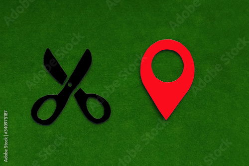 Obraz na płótnie Scissors, geolocation sign on a green background. Location of the Barber's services. w salonie