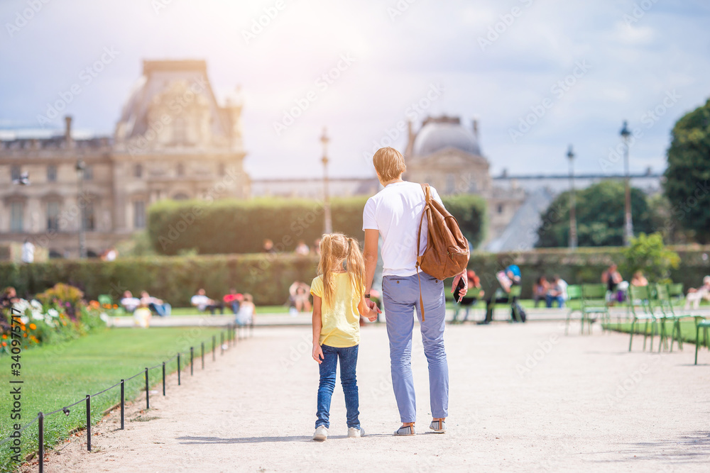 Obraz premium Family in European city, Paris, France. French summer holidays, travel and people concept.