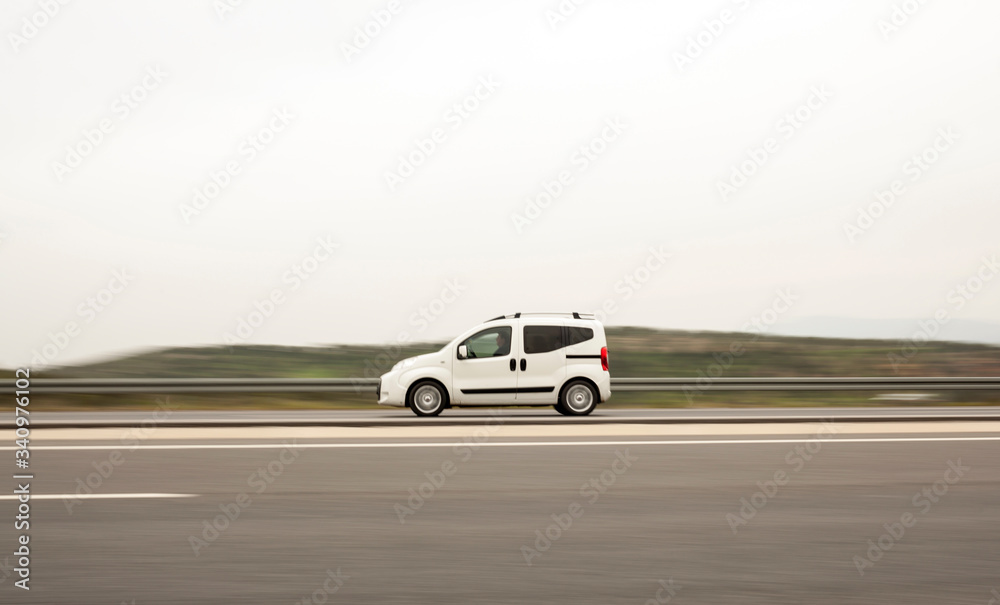 Fototapeta premium Speedy Delivery Van On Highway