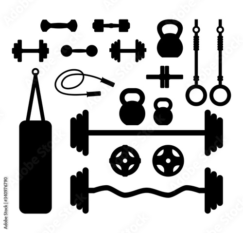 Fitness Accessories Set. Dumbbells, barbell, kettle bell, jump rope, discs, punching bag, sports rings, roller wheel, bumper plates. Home gum set.