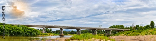 Panorama of the bridge in countryside, View of bridge on blue sky © piti