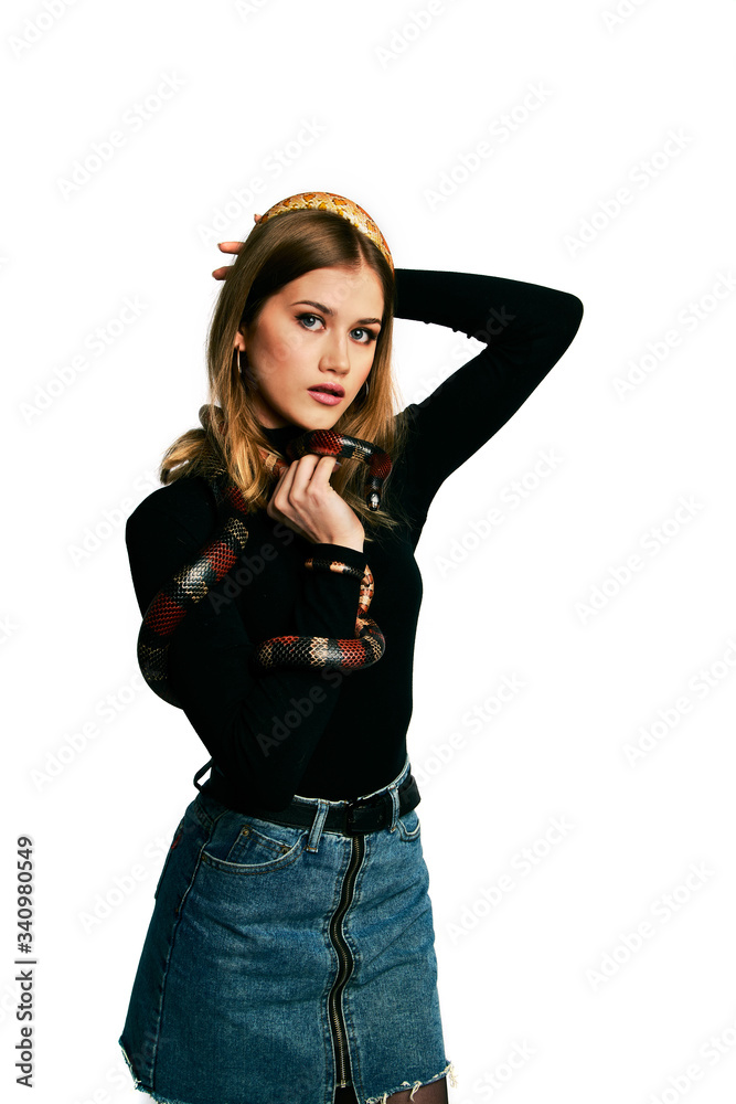 Beautiful woman in black bodywear and snake. Blonde model girl with fashion perfect make up. Beautiful woman in black bodywear and snake. Blonde model girl with fashion perfect make up.