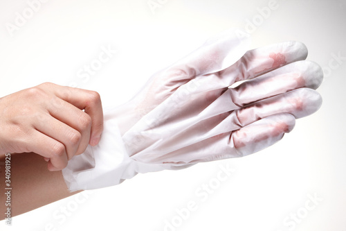 hands that wear protective gloves.