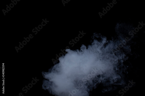 Smoke. Cloud of vapor. Dark blue background