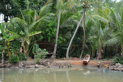 Hikkaduwa, Sri Lanka - March 11, 2019: A boat near Ratgama Lake photo