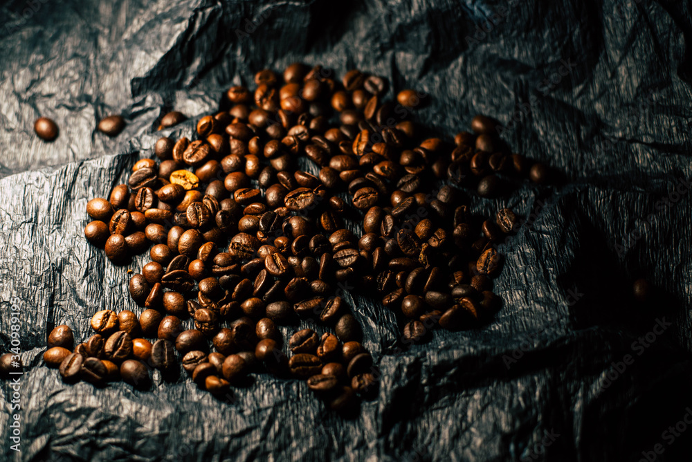 Coffee beans on black background Coffee beans on black background