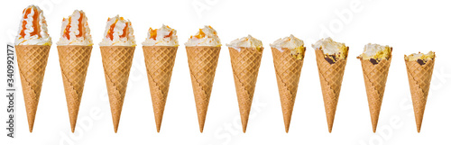 set ice cream in a waffle cone, different stages of eating.