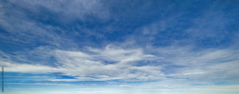 Blue sky background with clouds