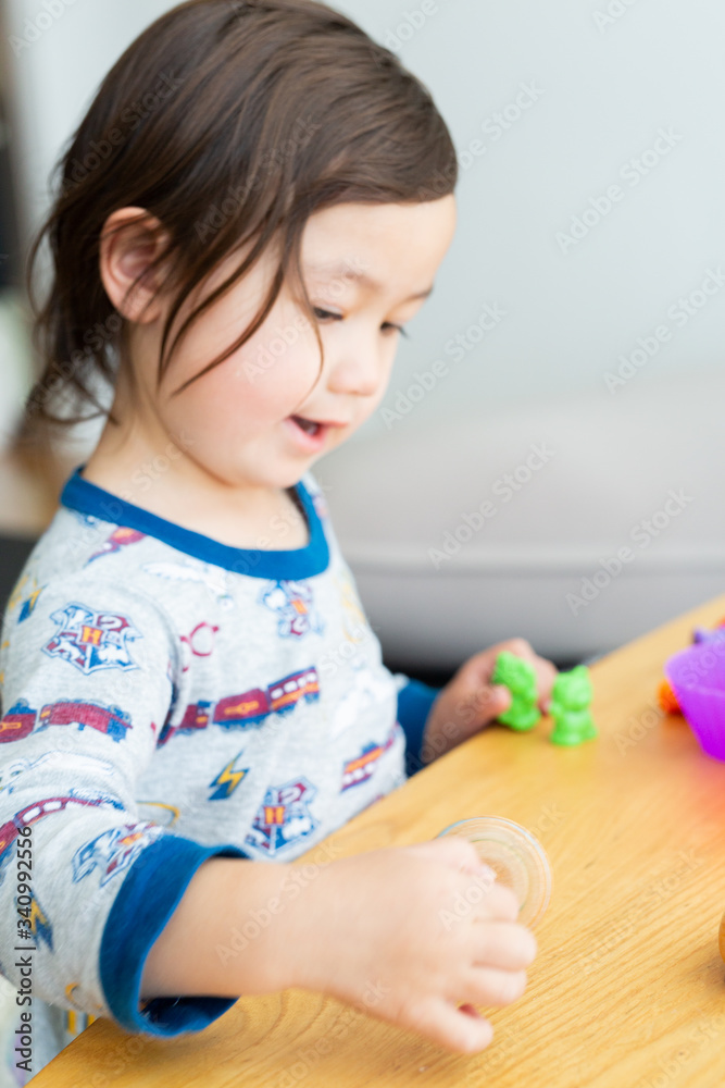 Toddler Girl Playing With Easter Toys Toddler Girl Playing With Easter Toys
